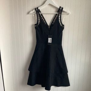 NWT Marciano Guess bandage style dress with crochet and gold details.